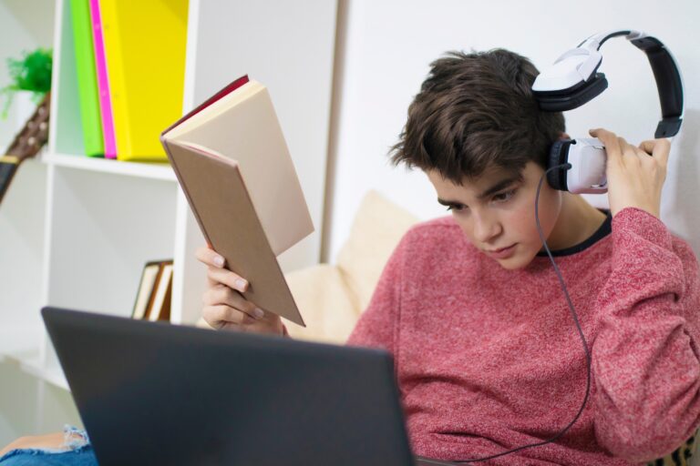 image of boy on laptop for escape room